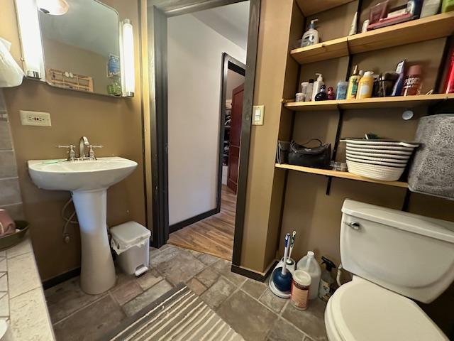 bathroom featuring toilet