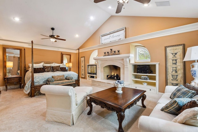 bedroom with light colored carpet, lofted ceiling, a premium fireplace, and ceiling fan