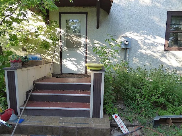 22519 County Road 3, Lake Edward Twp, MN 56465 - doorway to property with stucco siding