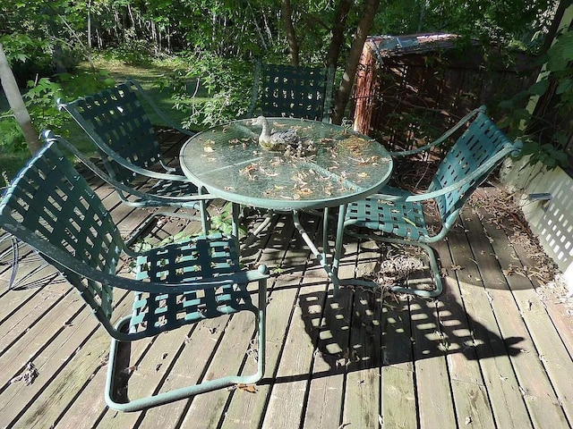 22519 County Road 3, Lake Edward Twp, MN 56465 - wooden deck with outdoor dining space