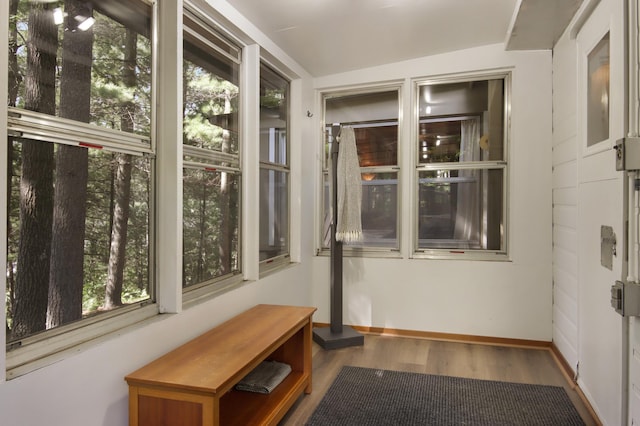 unfurnished sunroom with a healthy amount of sunlight