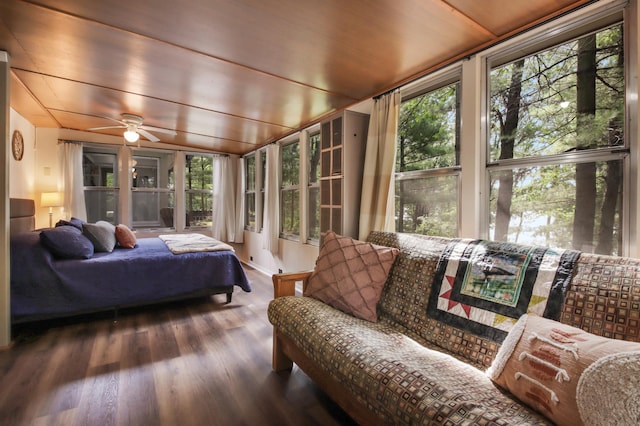 sunroom / solarium featuring ceiling fan