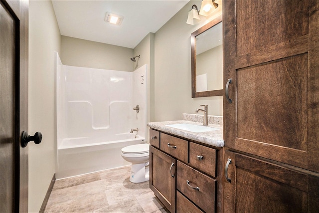 full bathroom with  shower combination, baseboards, toilet, and vanity