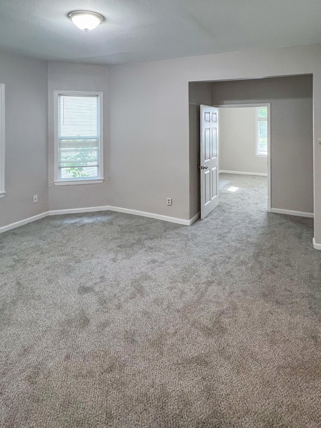 view of carpeted spare room