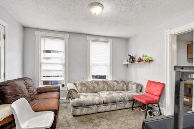 carpeted living room featuring a textured ceiling and cooling unit