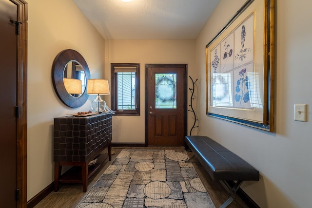 foyer with baseboards