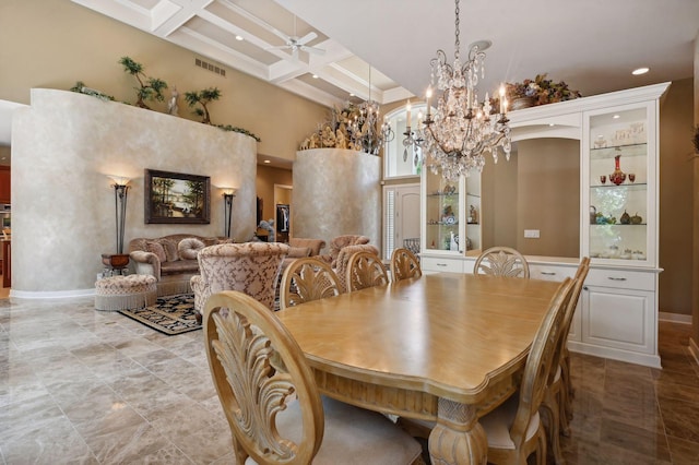 dining area featuring a high ceiling, coffered ceiling, ceiling fan with notable chandelier, and beam ceiling