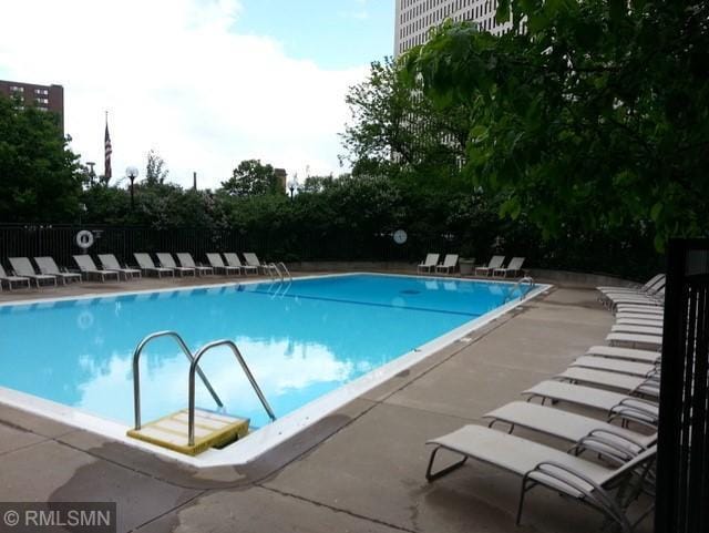 community pool with fence