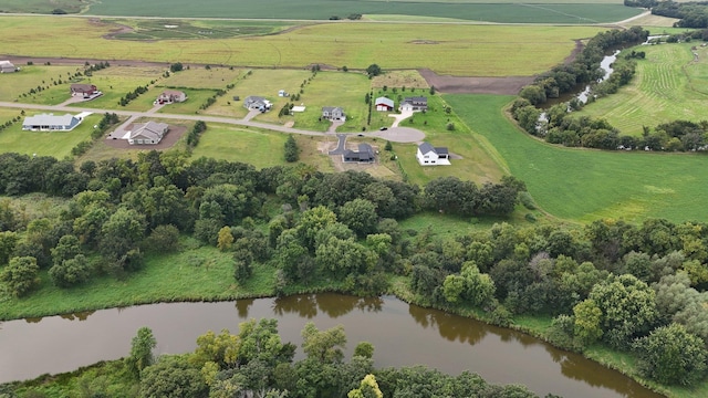 aerial view featuring a rural view and a water view