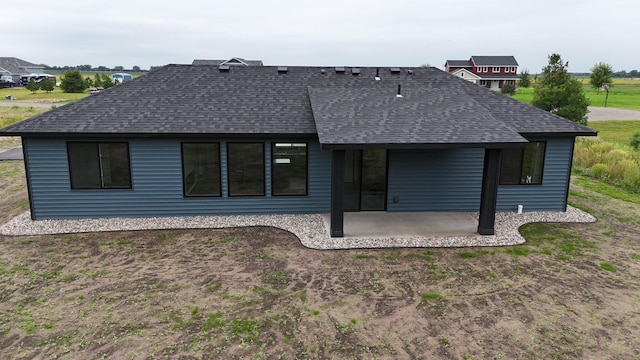 rear view of house featuring a patio area