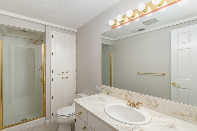 bathroom with toilet, visible vents, a stall shower, and a textured ceiling