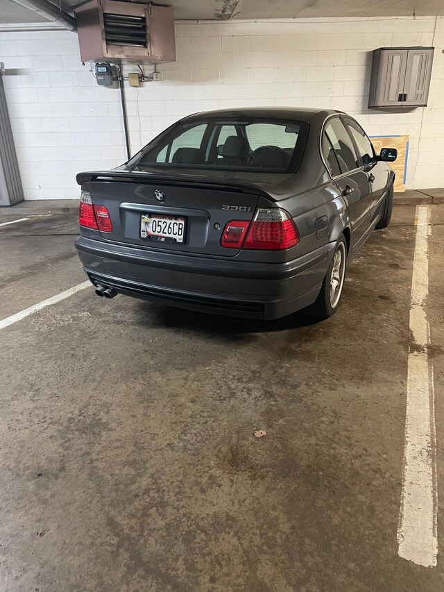 parking garage featuring concrete block wall