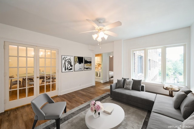 79 Western Ave N Unit 205, Saint Paul, MN 55102 - living room with wood finished floors, ceiling fan, and baseboards