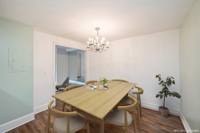 79 Western Ave N Unit 205, Saint Paul, MN 55102 - dining area with dark wood finished floors, a chandelier, baseboards, and electric panel