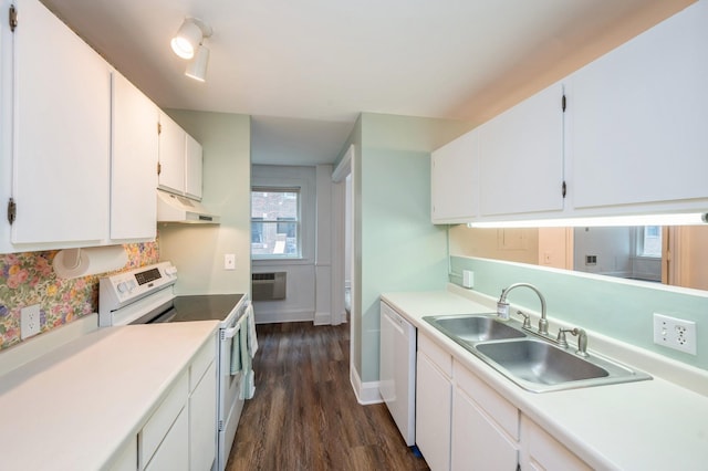 79 Western Ave N Unit 205, Saint Paul, MN 55102 - kitchen with white appliances, under cabinet range hood, a sink, dark wood-type flooring, and white cabinetry