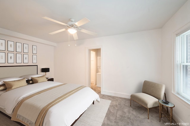 79 Western Ave N Unit 205, Saint Paul, MN 55102 - bedroom featuring light colored carpet, baseboards, and a ceiling fan