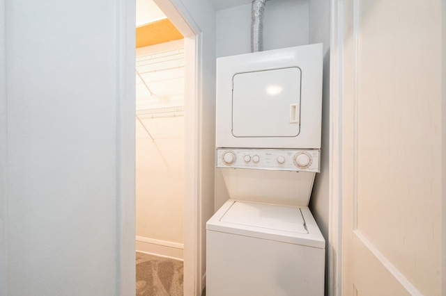 79 Western Ave N Unit 205, Saint Paul, MN 55102 - laundry area featuring estacked washer and dryer and carpet floors