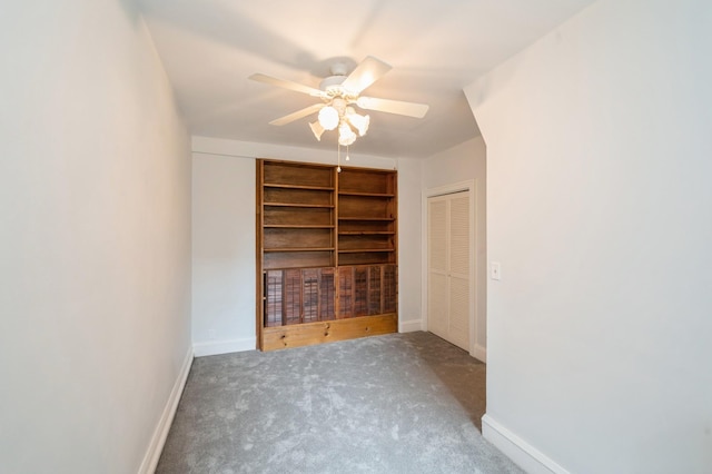 79 Western Ave N Unit 205, Saint Paul, MN 55102 - unfurnished bedroom featuring carpet, baseboards, and a ceiling fan