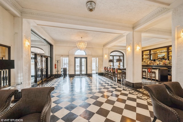 79 Western Ave N Unit 205, Saint Paul, MN 55102 - community lobby featuring a textured ceiling and crown molding