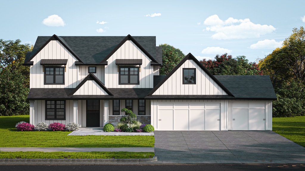 modern farmhouse featuring a front yard and a garage