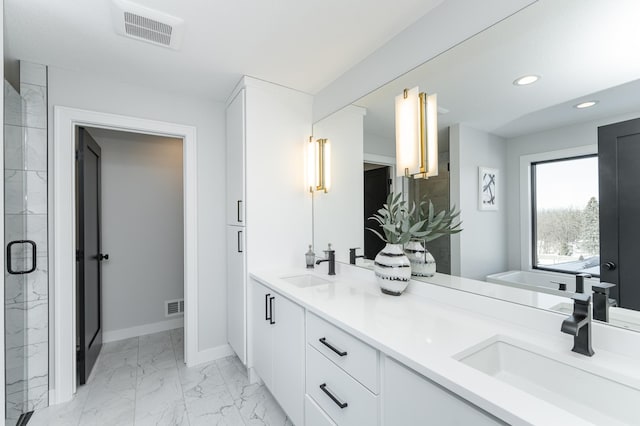 full bathroom with marble finish floor, a sink, and visible vents