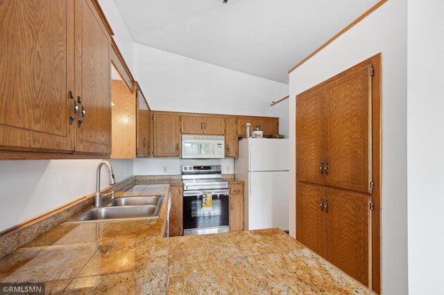 14797 Lower Endicott Way, Apple Valley, MN 55124 - kitchen featuring brown cabinetry, a sink, light countertops, lofted ceiling, and white appliances
