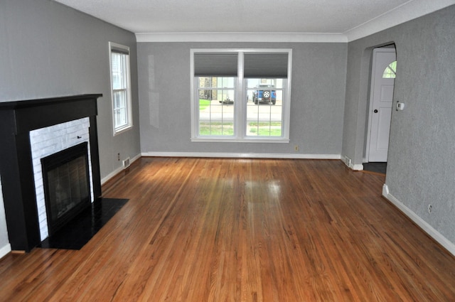 unfurnished living room with wood-type flooring