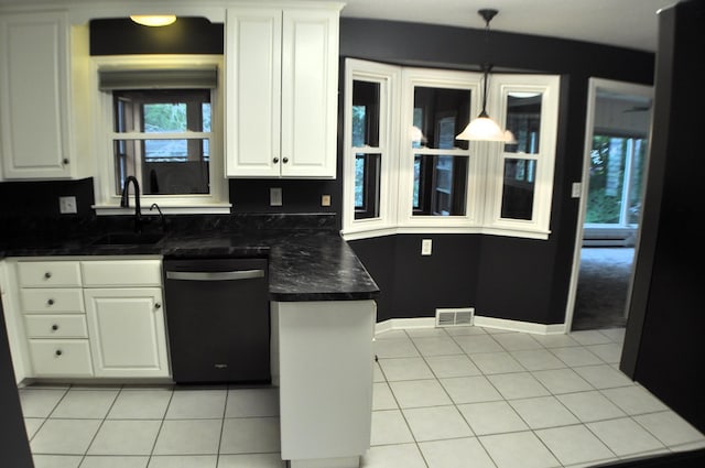 kitchen featuring sink, dishwasher, hanging light fixtures, and white cabinets