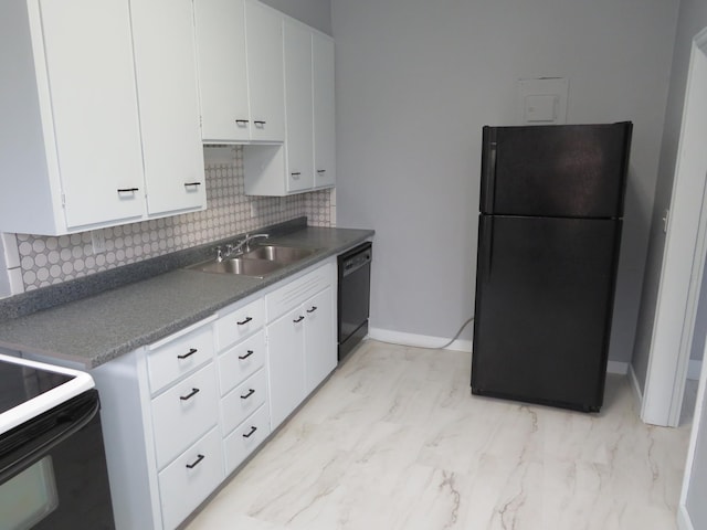 kitchen featuring white cabinets, black appliances, sink, and backsplash