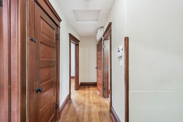 hallway featuring light hardwood / wood-style flooring