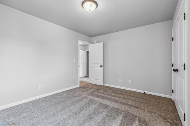 unfurnished bedroom featuring carpet flooring