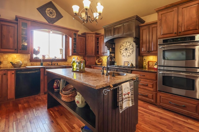 kitchen featuring open shelves, glass insert cabinets, stainless steel double oven, vaulted ceiling, and dishwasher