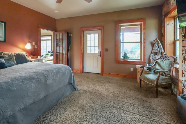 bedroom featuring carpet, baseboards, and ceiling fan