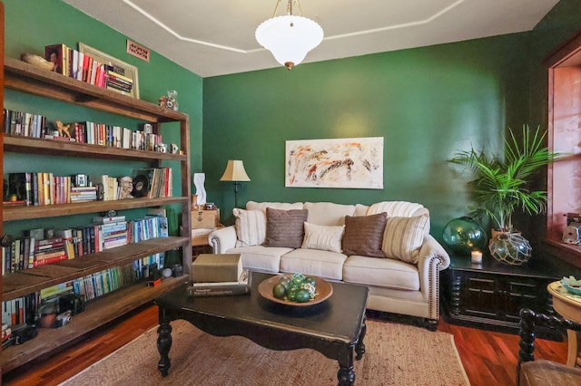 sitting room featuring dark wood-style floors