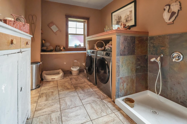 laundry room featuring laundry area and separate washer and dryer