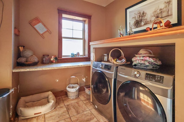 laundry area featuring laundry area and washer and clothes dryer