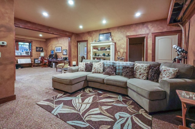 carpeted living area with recessed lighting