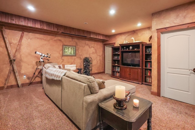 carpeted living room with recessed lighting