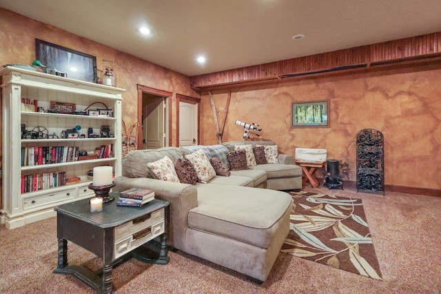 carpeted living area featuring recessed lighting