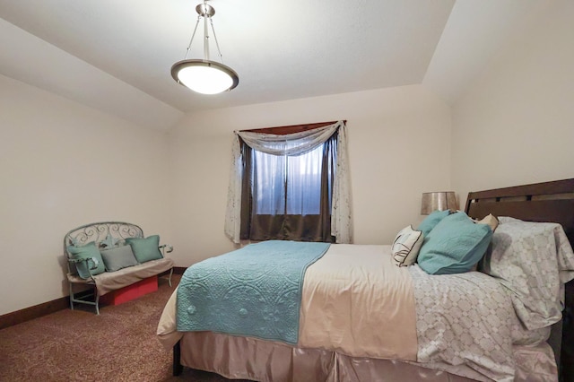 bedroom featuring carpet floors, vaulted ceiling, and baseboards