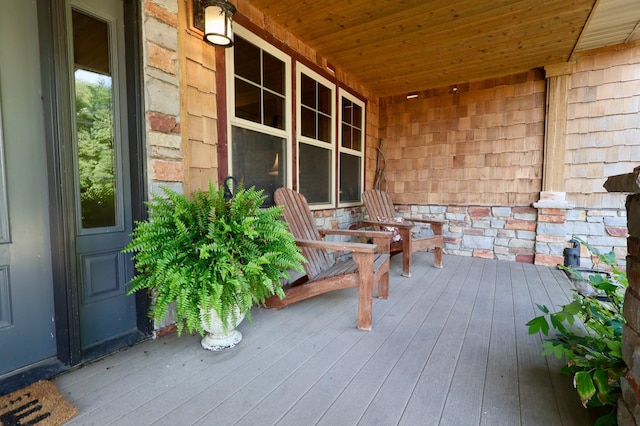 wooden deck featuring a porch