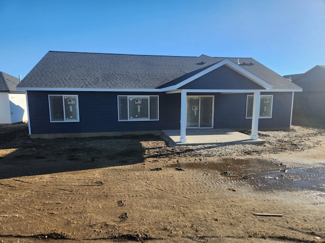 rear view of property with a patio area