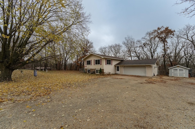 view of front of property with a storage shed