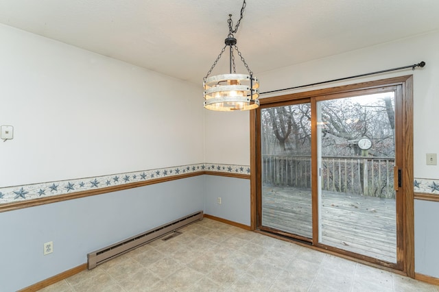 empty room with a chandelier and a baseboard radiator