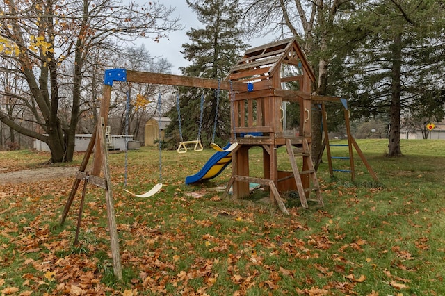 view of jungle gym featuring a lawn