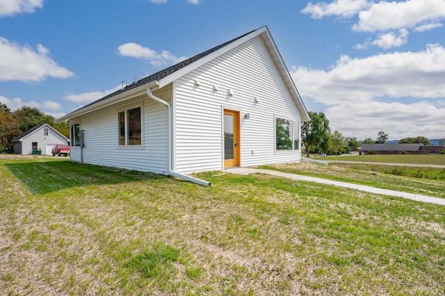 exterior space with a front yard