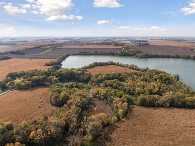 aerial view with a rural view and a water view