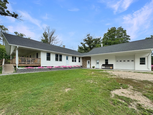 ranch-style house with a front lawn and a garage