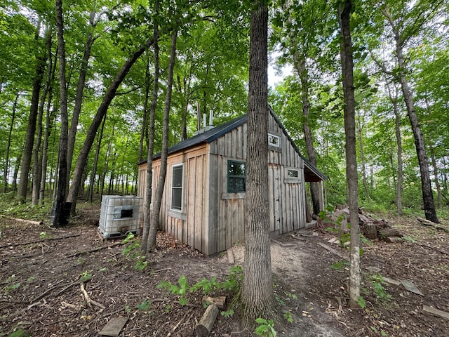 view of outdoor structure featuring central AC unit