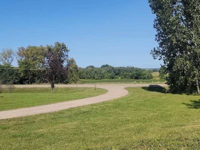 surrounding community featuring a lawn